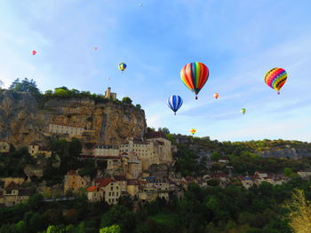 Hot air balloons flying in sky