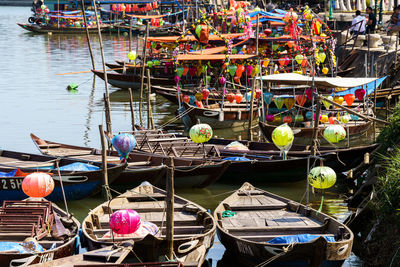 High angle view of boats moored at harbor