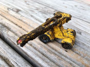 High angle view of rusty metal on table