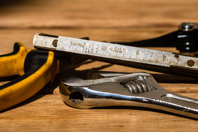 Close-up of work tools on table