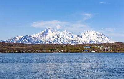 Avachinsky volcano towers over the city of petropavlovsk-kamchatsky. 