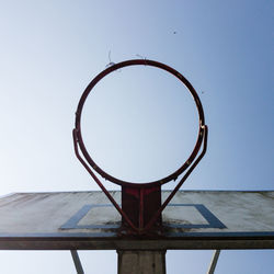 Close-up of basketball hoop against clear sky