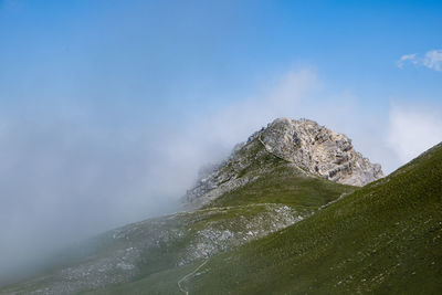 Scenic view of rocky mountains against sky