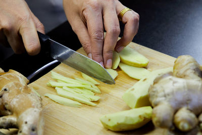 Midsection of person preparing food