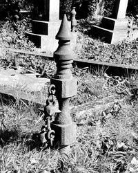 Close-up of cross in park