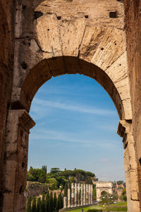 The arch of titus and the via sacra seen from the colosseum