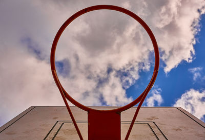 Low angle view of basketball hoop against sky