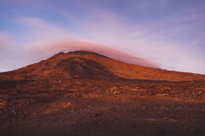 Scenic view of landscape against sky during sunset