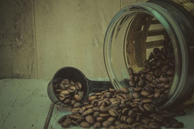 Close-up of coffee beans on table