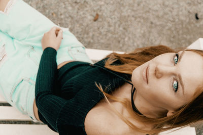 High angle portrait of woman lying down