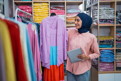 Portrait of woman standing in store