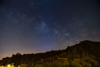 Mountain against sky at night