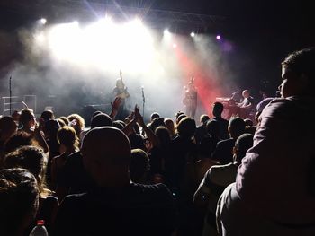 People enjoying music concert