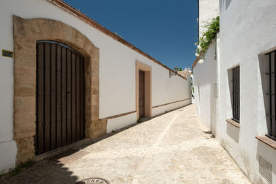 Alley amidst buildings in city