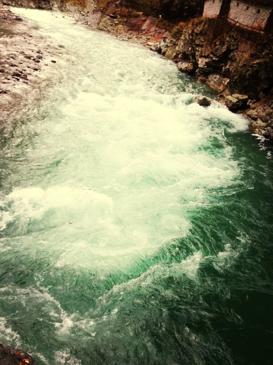 water, high angle view, rock - object, motion, surf, nature, flowing water, beauty in nature, river, sea, day, wave, no people, flowing, outdoors, rippled, scenics, rock formation, tranquility, stream