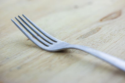 Close-up of spoon on table