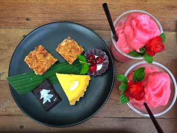 High angle view of fruits in plate on table