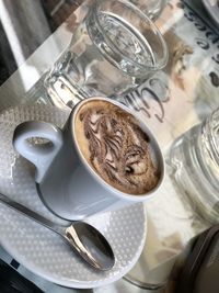 High angle view of coffee on table