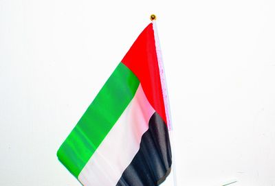 Close-up of flag over white background