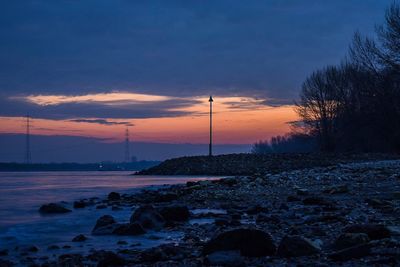 Scenic view of landscape against sky during sunset