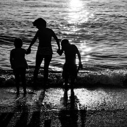 People standing at seaside