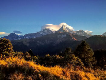 Scenic view of mountains against clear sky