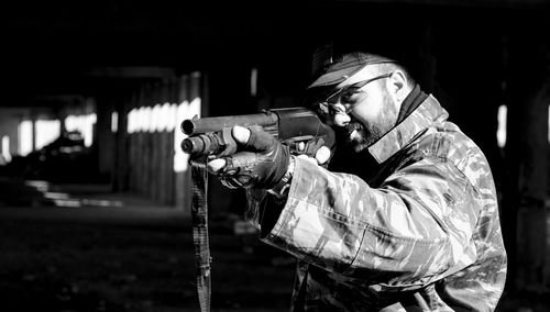 Man shooting a rifle