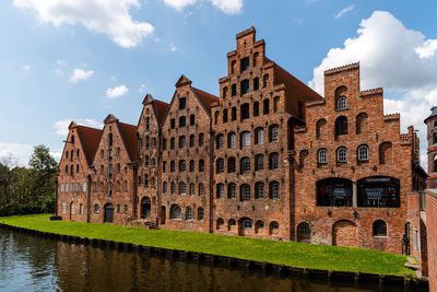 Lubeck, germany. salzspeicher buildings. six historic brick buildings on the upper trave river