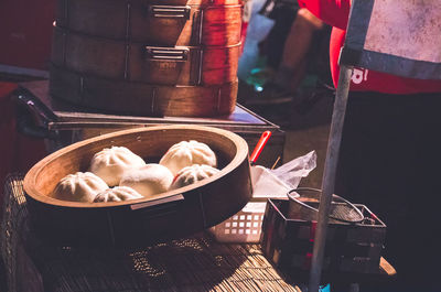 High angle view of dumplings in steamer at market stall