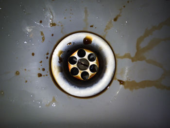 Close-up of drainage plugholes