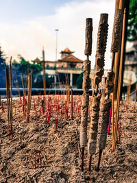 Close-up of clothes drying against sky