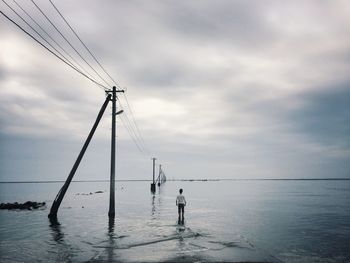 Scenic view of sea against cloudy sky