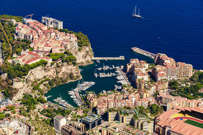 High angle view of townscape by sea