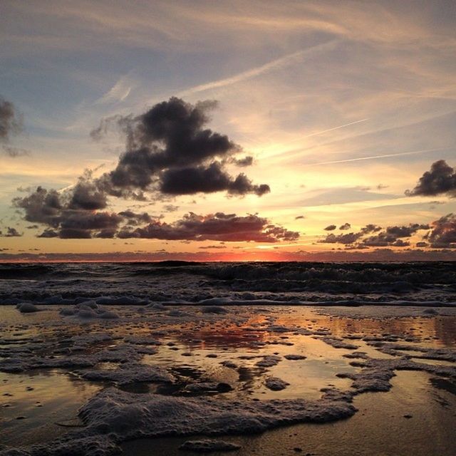 sunset, tranquil scene, scenics, tranquility, sky, beauty in nature, water, cloud - sky, orange color, nature, beach, idyllic, sea, shore, cloud, non-urban scene, outdoors, cloudy, remote, dramatic sky