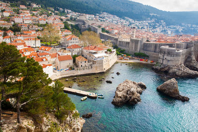 Dubrovnik west pier and medieval fortifications of the city seen from fort lovrijenac
