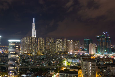 Illuminated buildings in city at night