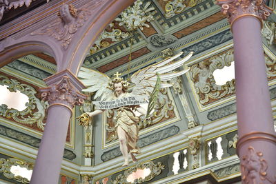 Low angle view of statue in historic building