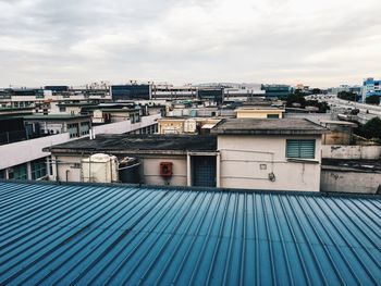 High angle view of buildings against sky