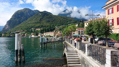 Panoramic view of buildings and mountains against sky