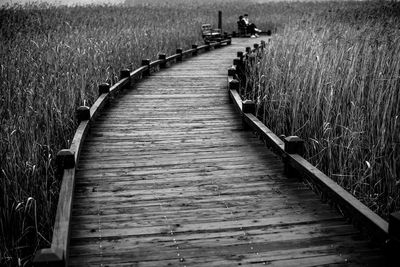 Empty boardwalk on field