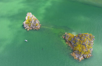 High angle view of water on rock in sea