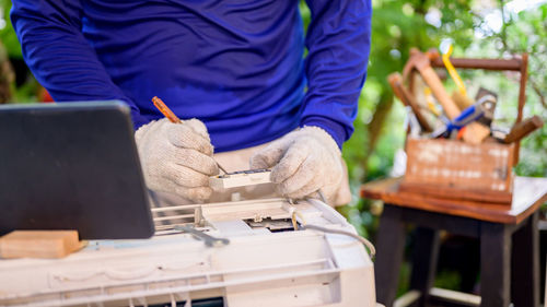 Man working on wood