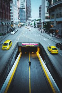 High angle view of vehicles on road in city