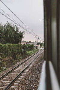 Railway tracks against clear sky