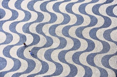 High angle view of two people walking