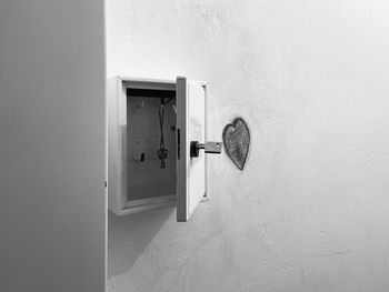Close-up of open door of house