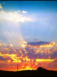 Scenic view of silhouette landscape against sky during sunset