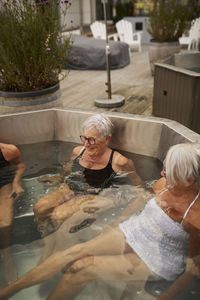 Senior women relaxing in hot tub