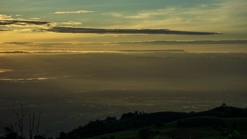 Scenic view of silhouette landscape against sky during sunset