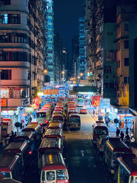 High angle view of traffic on city street at night